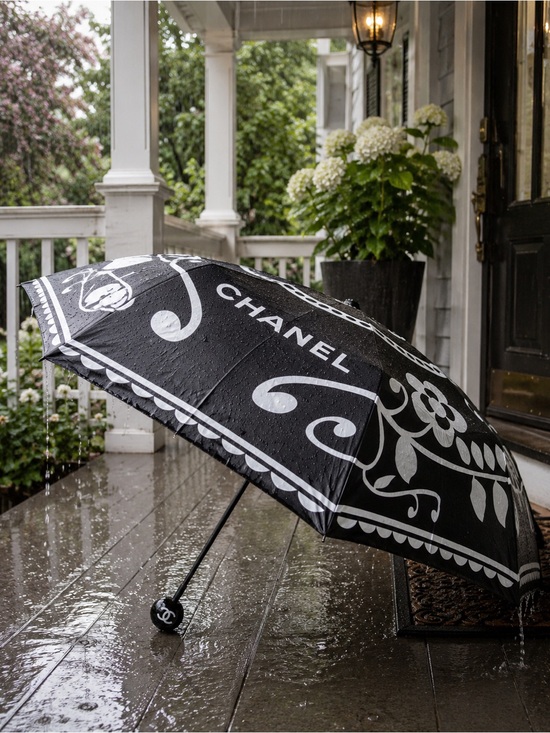 CHANEL Accessories - Chanel umbrella Black & White
Floral Luxe Automatic EUC
W/slip pocket